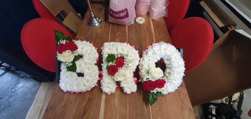 SERVICE- TRIBUTE ARRANGEMENTS Flowers