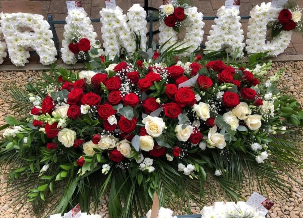 SERVICE- TRIBUTE ARRANGEMENTS Flowers