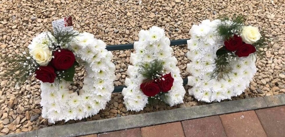 SERVICE- TRIBUTE ARRANGEMENTS Flowers